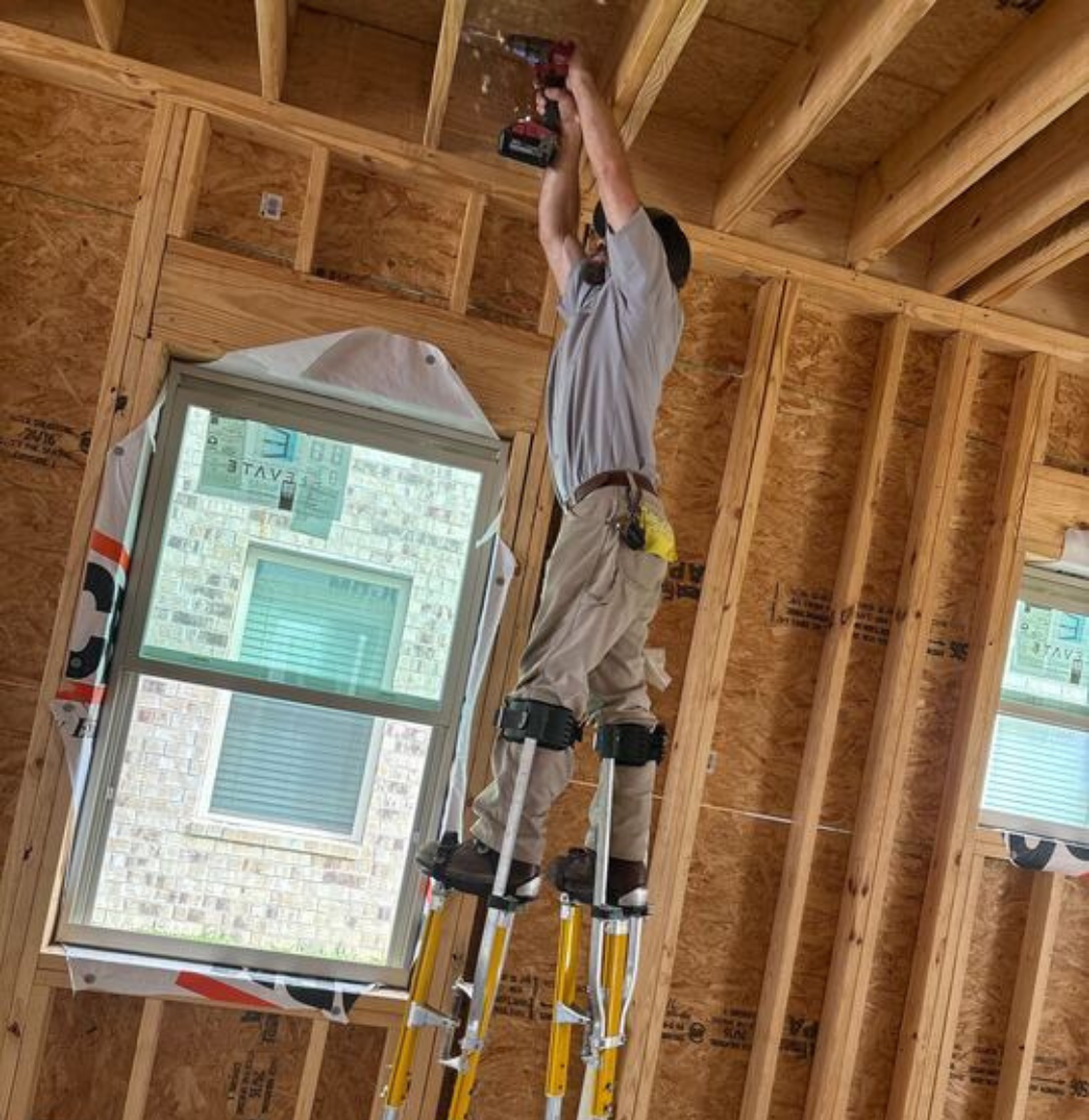 Crew replacing storm-damaged shingles on a Port Neches home after a detailed roof inspection
